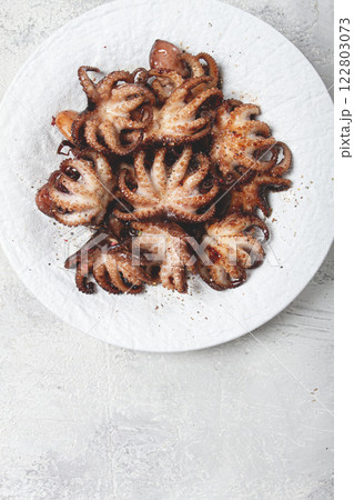 Baby octopus grilled on a white plate, homemade, no people, 122803073