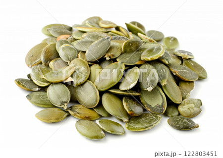 Heap of green pumpkin seeds isolated on white background 122803451