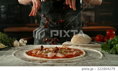 Closeup of Chef Making Pizza in Restaurant . Closeup of Pizza Preparation Closeup of Chef Making Pizza in Restaurant . Closeup of Pizza Preparation 122804279