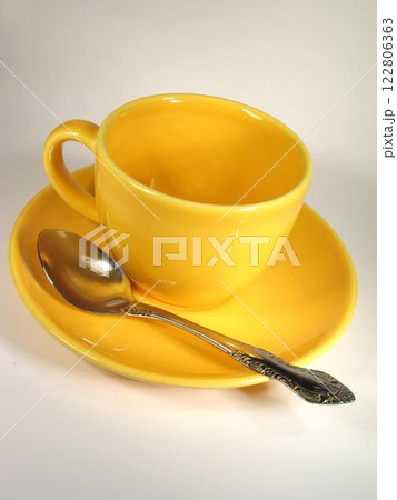 A cup of coffee on a table close view background A cup of coffee on a table close view background 122806363