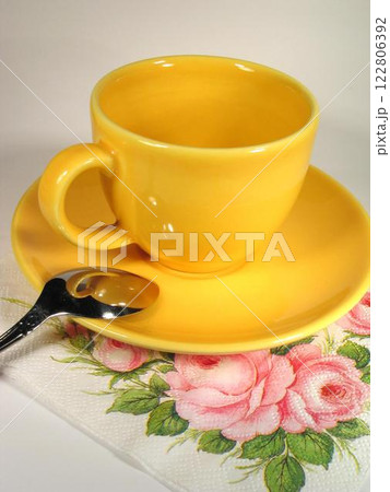 A cup of coffee on a table close view background 122806392