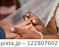 Wedding Couple Exchanging Rings: Romantic Ceremony Moment 122807602