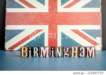 BIRMINGHAM. Urban Area in Great Britain. Flag and alphabet letters on wooden texture background 122807754