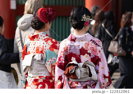 Young girl wearing Japanese kimono standing in front of Sensoji Temple in Tokyo, Japan. Kimono is a Japanese traditional garment. The word "kimono", which actually means a "thing to wear" 122812061