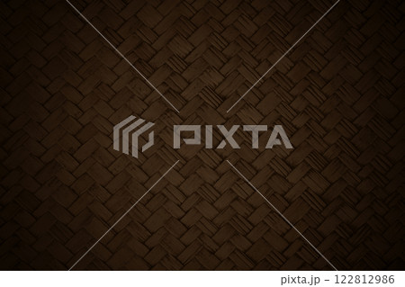 Dark brown bamboo weaving pattern, old woven rattan mat texture for background and design art work. Dark brown bamboo weaving pattern, old woven rattan mat texture for background and design art work. 122812986