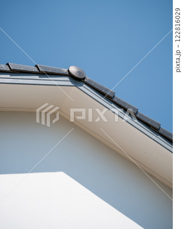 Home roof detail modern architecture residential area bright sky close-up view design elements Home roof detail modern architecture residential area bright sky close-up view design elements 122816029
