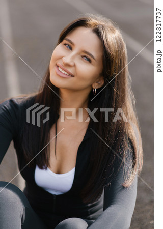 Smiling Woman In Sporty Outfit Smiling Woman In Sporty Outfit 122817737