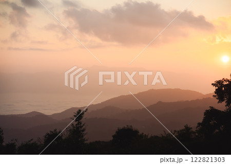 landscape and travel concept with sunrise and layer of mountain and mist with forest on morning landscape and travel concept with sunrise and layer of mountain and mist with forest on morning 122821303