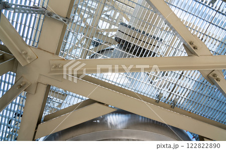 Detailed view of an industrial framework showcasing durable metal construction and engineering precision Detailed view of an industrial framework showcasing durable metal construction and engineering precision 122822890