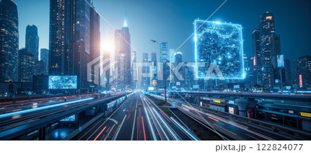 Nighttime view of futuristic city with tall, illuminated skyscrapers, glowing streetlights, and bustling roads, highlighting advanced urban infrastructure and modern architectural design 122824077