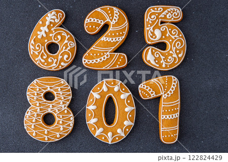 Iced Gingerbread Numbers Cookies Food background. Christmas decor. 122824429