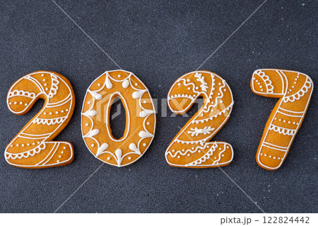 2027 numbers Gingerbread New Year date. Food background. Christmas cookies. 122824442