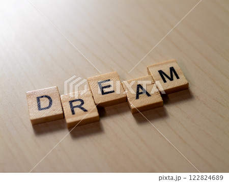 Inspiring action to achieve dreams home office motivational quote indoor close-up personal growth 122824689