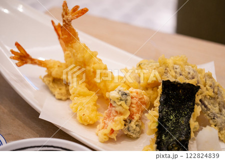 Experience the taste of tempura shrimp & veggies in our cozy japanese restaurant Experience the taste of tempura shrimp & veggies in our cozy japanese restaurant 122824839