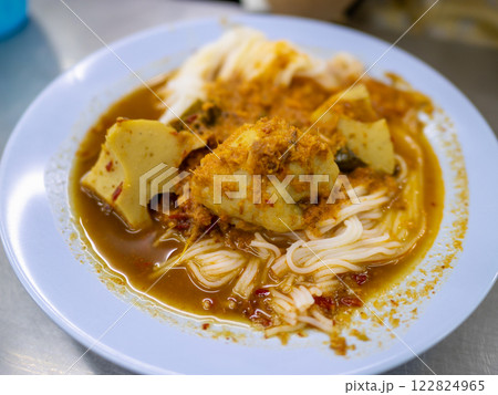 Savoring urban curry noodles a close-up culinary experience at local eatery 122824965