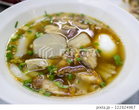 Delicious chicken soup recipe home kitchen food cozy environment close-up comforting concept 122824967