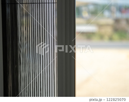 Window view of modern architecture with screen outdoor environment close-up perspective 122825070