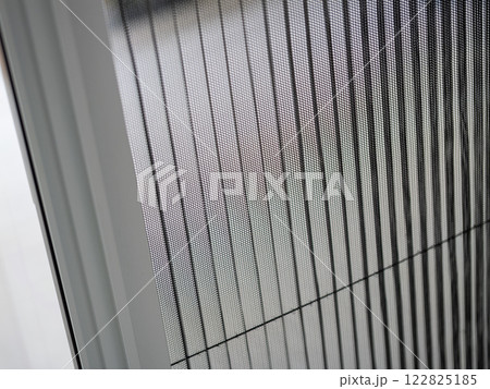 Window screen mesh close-up indoor setting photography minimalist design abstract viewpoint 122825185