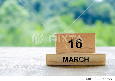16 March calendar on wooden table with customizable space for text, ideas or messages. Calendar and copy space concept 122827295