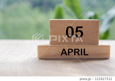 5 April calendar on wooden table with customizable space for text, ideas or messages. Calendar and copy space concept 5 April calendar on wooden table with customizable space for text, ideas or messages. Calendar and copy space concept 122827312