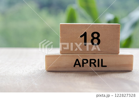 18 April calendar on wooden table with customizable space for text, ideas or messages. Calendar and copy space concept. 122827328