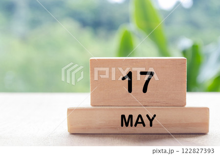 17 May text on wooden blocks with customizable space for text or messages. Month and copy space concept 122827393
