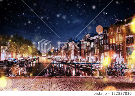 Bicycles Parked Along a Bridge Over the Canals of Amsterdam, Net Bicycles Parked Along a Bridge Over the Canals of Amsterdam, Net 122827830