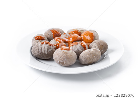 Papas arrugadas with mojo isolated on white background. Traditional Canary Islands food. 122829076