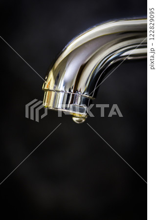 A drop of water from the faucet 122829095
