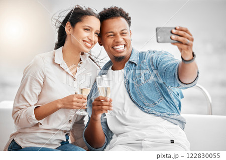 Couple selfie, luxury boat cruise and champagne wine glass celebration for anniversary, honeymoon and love in Miami Florida. Happy man, smile woman and yacht party photos, travel and summer sea relax 122830055
