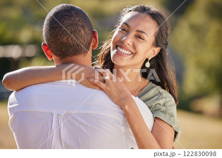 Love, hug and couple in park or green garden, summer sunshine and smile portrait. Adventure, wellness and romance wife woman embrace husband on valentines day anniversary or honeymoon nature getaway Love, hug and couple in park or green garden, summer sunshine and smile portrait. Adventure, wellness and romance wife woman embrace husband on valentines day anniversary or honeymoon nature getaway 122830098
