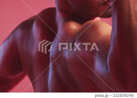 Sexy man, strong back and muscle bodybuilder in nude, fitness and skin against colorful studio background. Naked, healthy and powerful guy closeup with shoulder strength, muscular and flexing arms Sexy man, strong back and muscle bodybuilder in nude, fitness and skin against colorful studio background. Naked, healthy and powerful guy closeup with shoulder strength, muscular and flexing arms 122830240