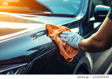 Washing car with cloth. Hand polishing vehicle. Ai Generative 122830542