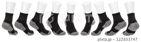 Black sports sock with reinforced heel and toe on a mannequin foot Black sports sock with reinforced heel and toe on a mannequin foot 122833747