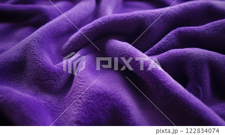Purple fabric with a fuzzy texture. It is a close up of the fabric 122834074