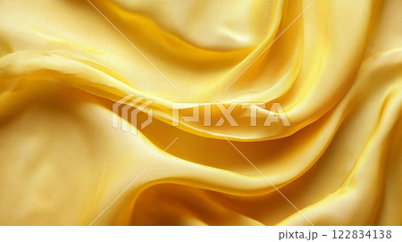 Yellow fabric with a wave pattern. The fabric is very soft and smooth. It looks like it would be comfortable to wear 122834138