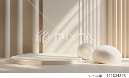 White room with a white wall and a white ceiling. There are two white balls on the floor White room with a white wall and a white ceiling. There are two white balls on the floor 122834298