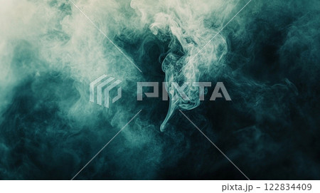 Blue sky with smoke in the background. The smoke is thick and dark, giving the impression of a stormy day 122834409