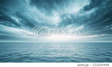Large body of water with a cloudy sky above it. The sky is mostly blue with some white clouds scattered throughout. The water appears calm and peaceful, with no signs of any activity Large body of water with a cloudy sky above it. The sky is mostly blue with some white clouds scattered throughout. The water appears calm and peaceful, with no signs of any activity 122834446