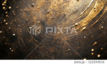 Gold and black painting with a lot of gold and black specks. The painting has a lot of gold and black colors and it looks like a swirl 122834618