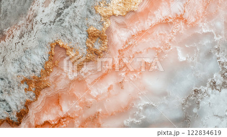 Gold and white marble wall with a gold border. The wall is textured and has a shiny, metallic appearance 122834619