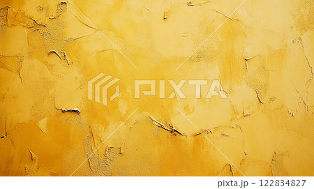 Yellow wall with a lot of paint peeling off. The wall has a lot of texture and he is unfinished Yellow wall with a lot of paint peeling off. The wall has a lot of texture and he is unfinished 122834827