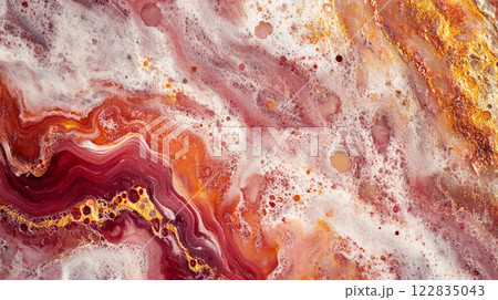 Red and white swirl pattern with a lot of bubbles. The bubbles are in different sizes and are scattered throughout the image. Scene is playful and fun 122835043