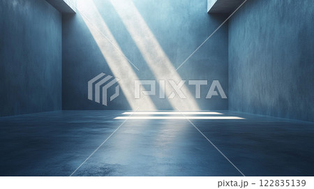 Large room with a blue wall and a white ceiling. The room is empty and has no furniture Large room with a blue wall and a white ceiling. The room is empty and has no furniture 122835139