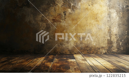 Room with a wall that is covered in dirt and has a wooden floor. The room is empty and has a very old and worn appearance 122835215