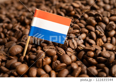 Netherlands flag on coffee bean, import export trade online commerce concept. 122835544