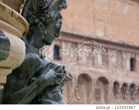 A sculpture of lactating Nereid as a part of The Fountain of Neptune in Bologna, Italy 122835867