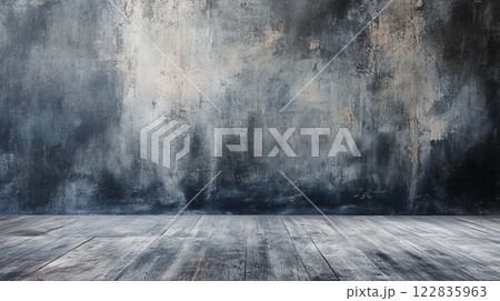 Large, empty room with a grey wall and wooden floor. The room is bare and empty, with no furniture or decorations. The grey wall and wooden floor give the room a cold, industrial feel Large, empty room with a grey wall and wooden floor. The room is bare and empty, with no furniture or decorations. The grey wall and wooden floor give the room a cold, industrial feel 122835963