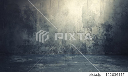 Large, empty room with a wall that is covered in graffiti. The room is bare and has a sense of emptiness 122836115