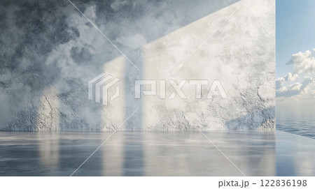 Large white wall with a cloudy sky in the background. The wall is empty and has a reflective surface 122836198